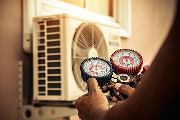 Professional Hvac technician working in Mayville, ND